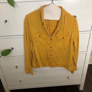 Yellow button down shirt